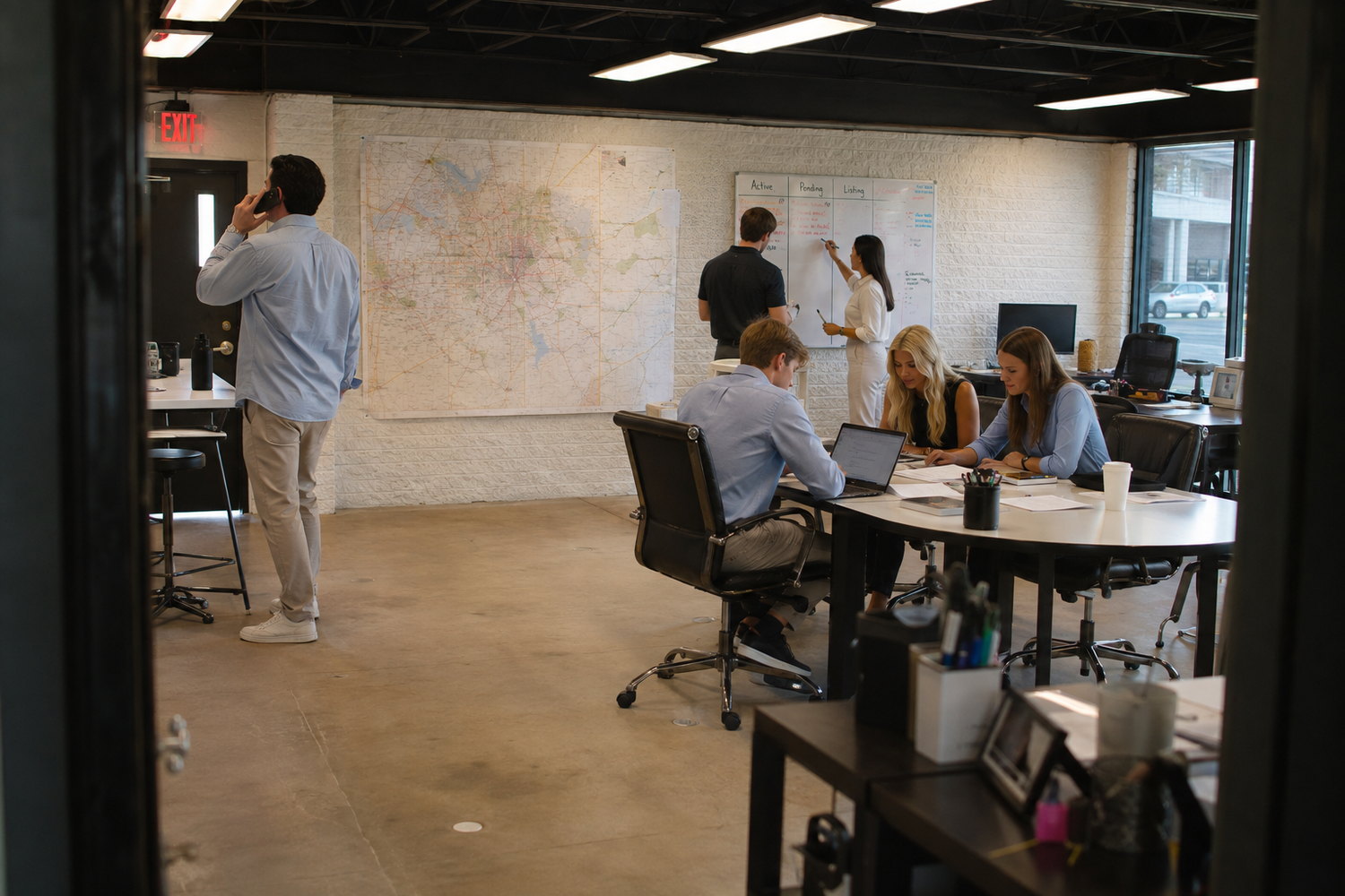 The Rise Realty team at work in the Richardson office
